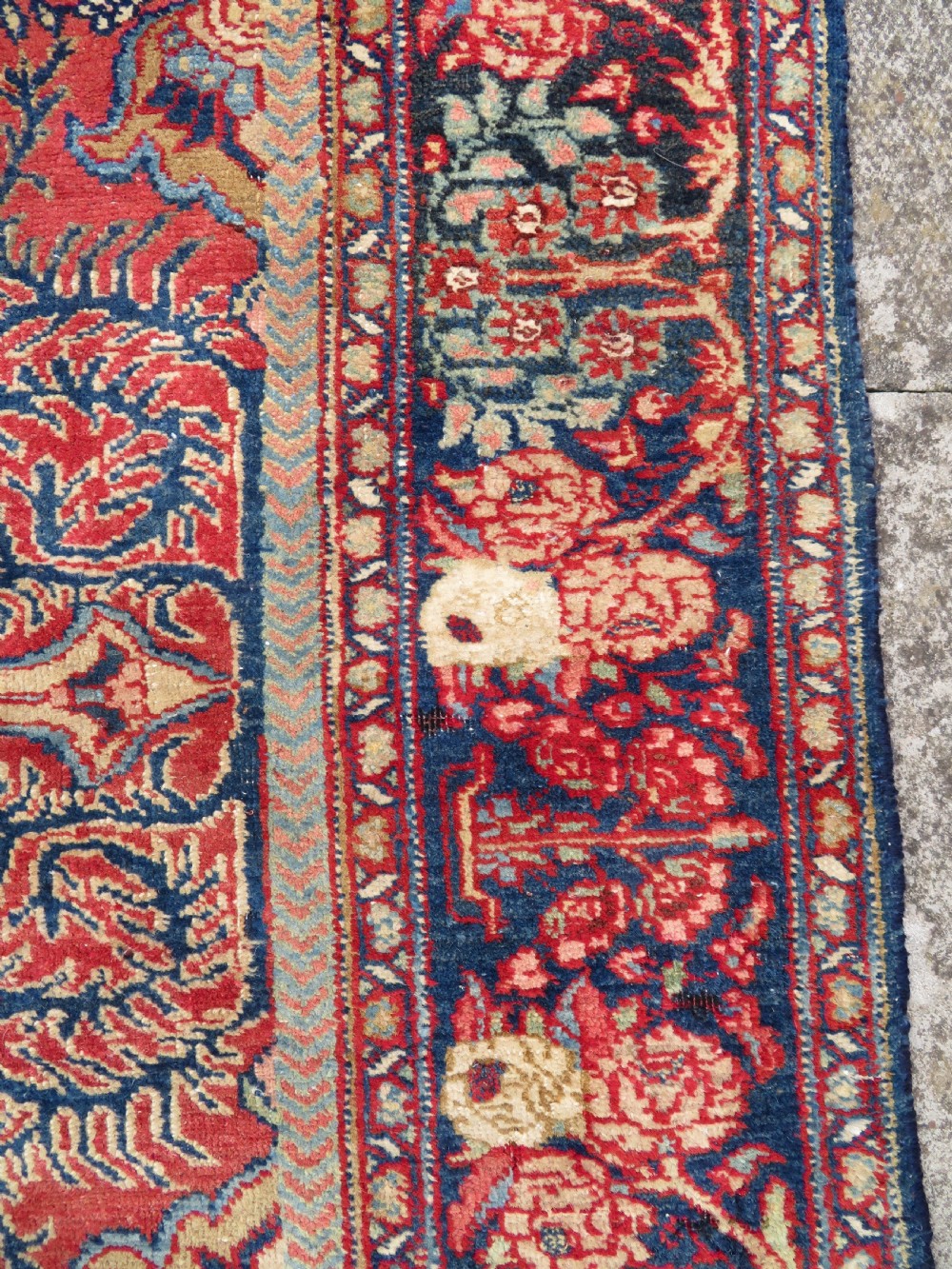 An antique hand-knotted North West Persian Tabriz rug featuring a central floral medallion surrounded by detailed terracotta red, navy blue, and cream motifs. View XIII