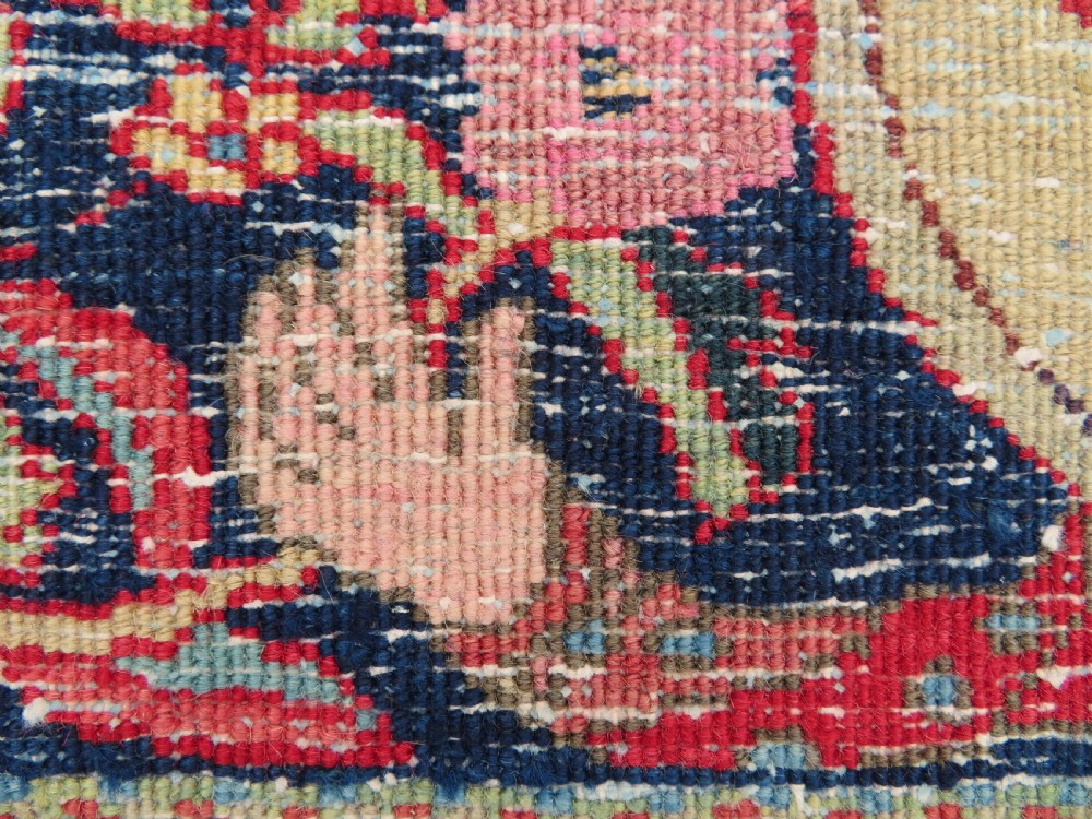 An antique hand-knotted North West Persian Tabriz rug featuring a central floral medallion surrounded by detailed terracotta red, navy blue, and cream motifs. View XXII