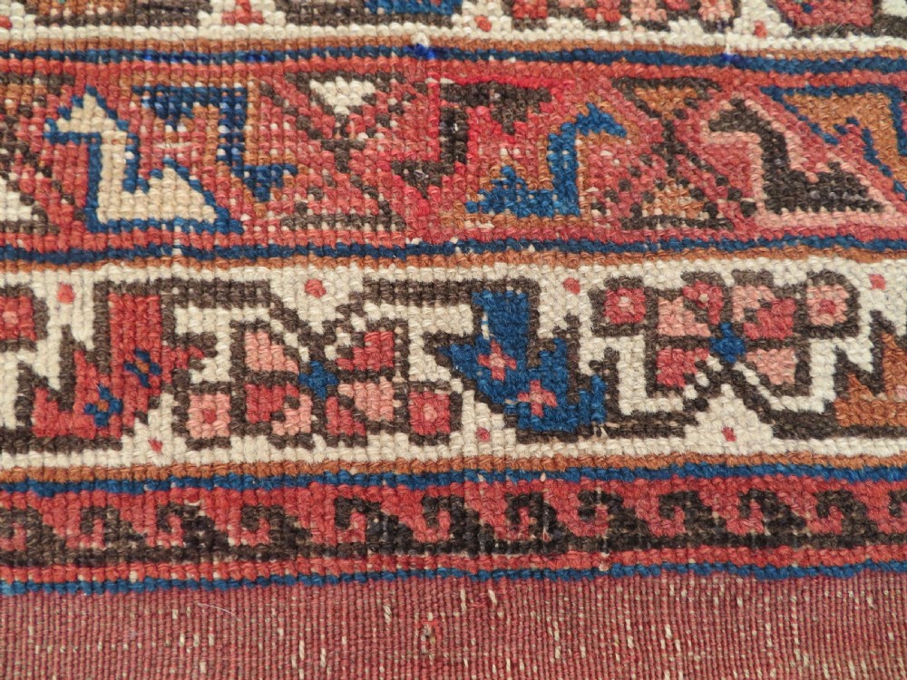EARLY PATTERN ANTIQUE KHAMSEH RUG. 2ND HALF 19TH CENTURY. SOUTH WEST PERSIA. 168CM X 125CM. View XIX