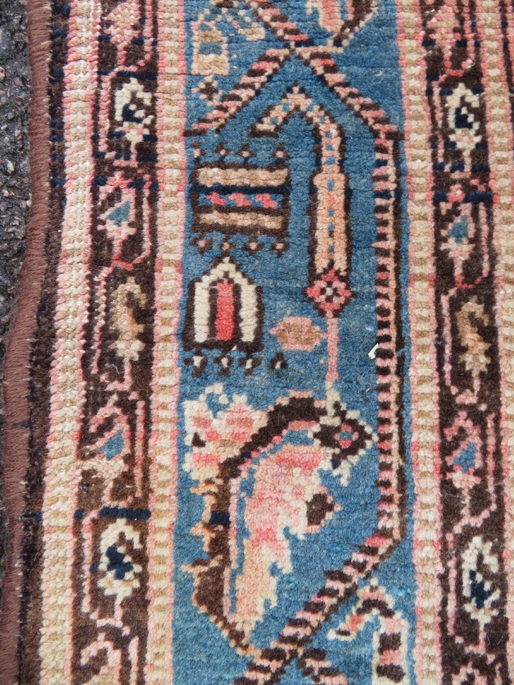 A hand-knotted Bidjar Persian rug featuring a navy blue diamond medallion, salmon pink spandrels, and multi-layered blue floral borders. View XIII