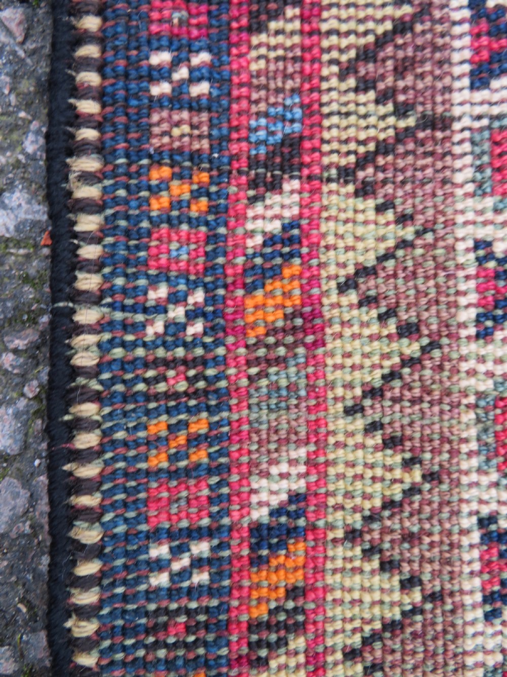 A handwoven Luri tribal rug featuring double geometric diamond medallions in navy blue and red with multi-layered patterned borders. View XXII