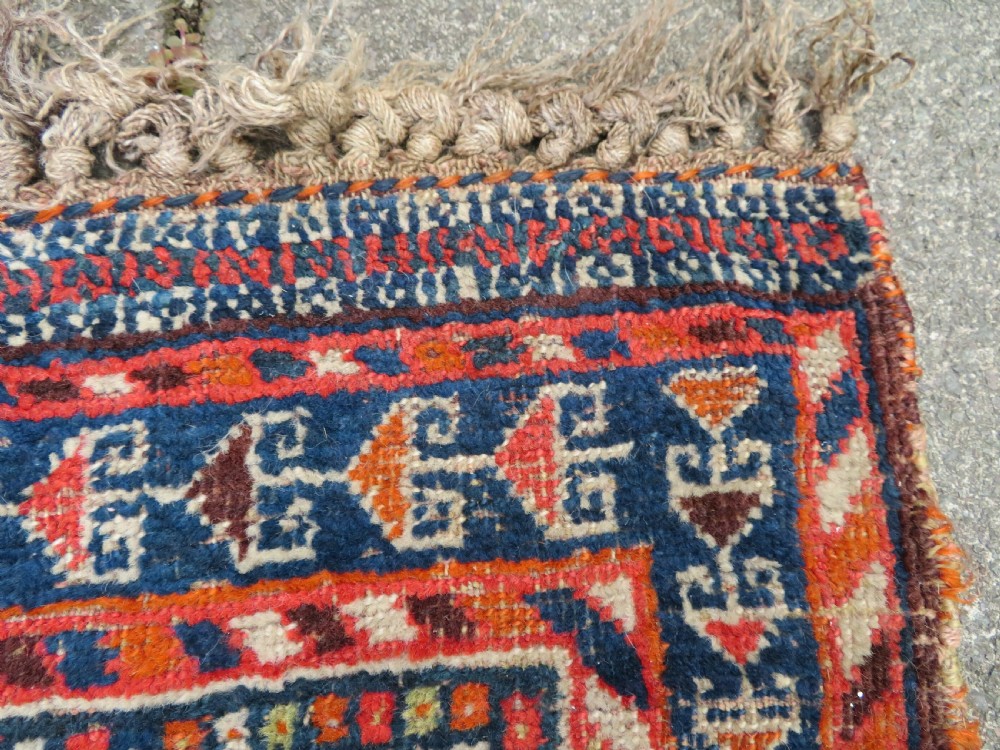 Distressed Antique Khamseh Rug. South West Persia. 150cm X 100cm View X