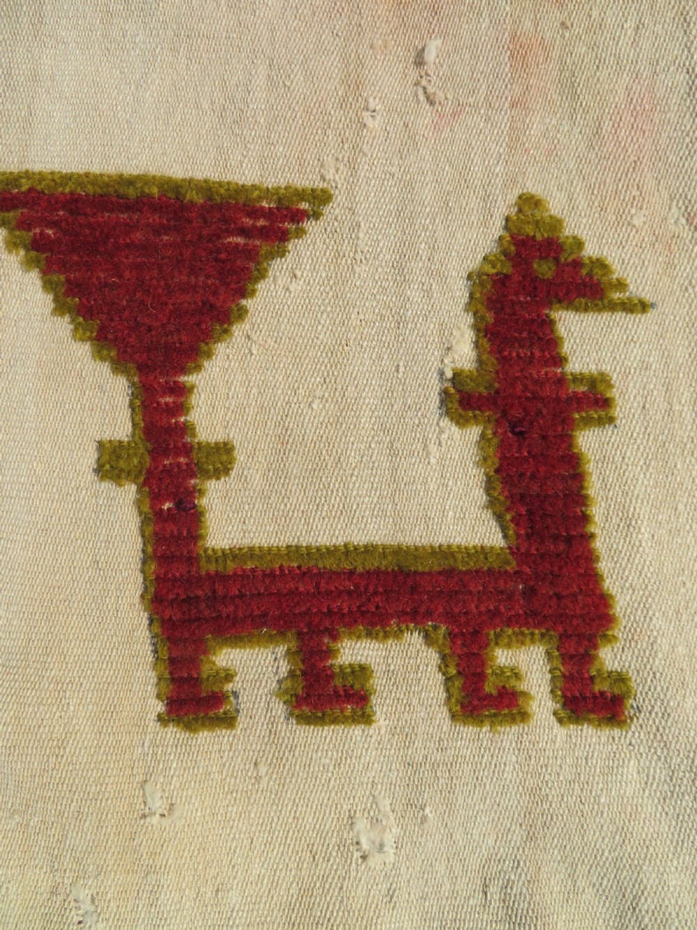 An antique cream handwoven wool Qashqai horse cover featuring colourful geometric patterns, human and camel motifs, and decorative edge tassels. View VII