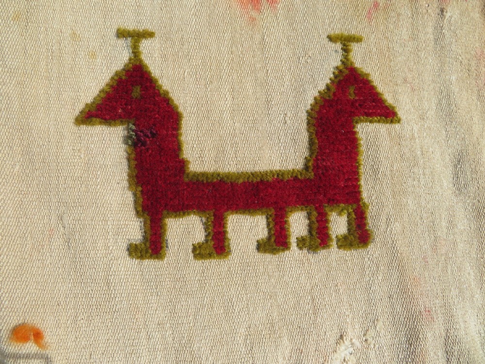 An antique cream handwoven wool Qashqai horse cover featuring colourful geometric patterns, human and camel motifs, and decorative edge tassels. View VIII