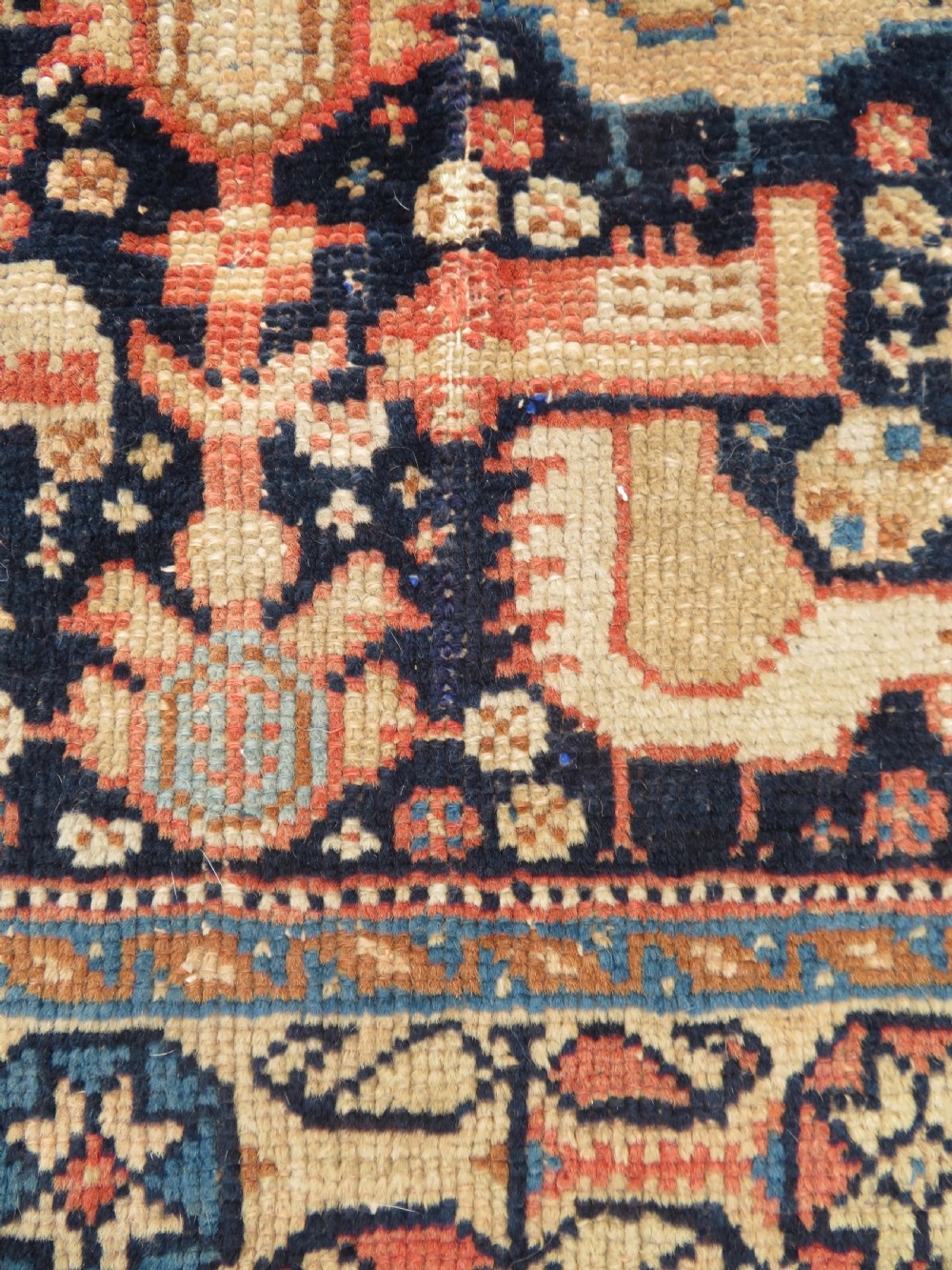 A 19th-century Khamseh hand-knotted wool bag face featuring stylised bird motifs framed by intricate geometric borders in navy blue, terracotta, and ochre. View IV