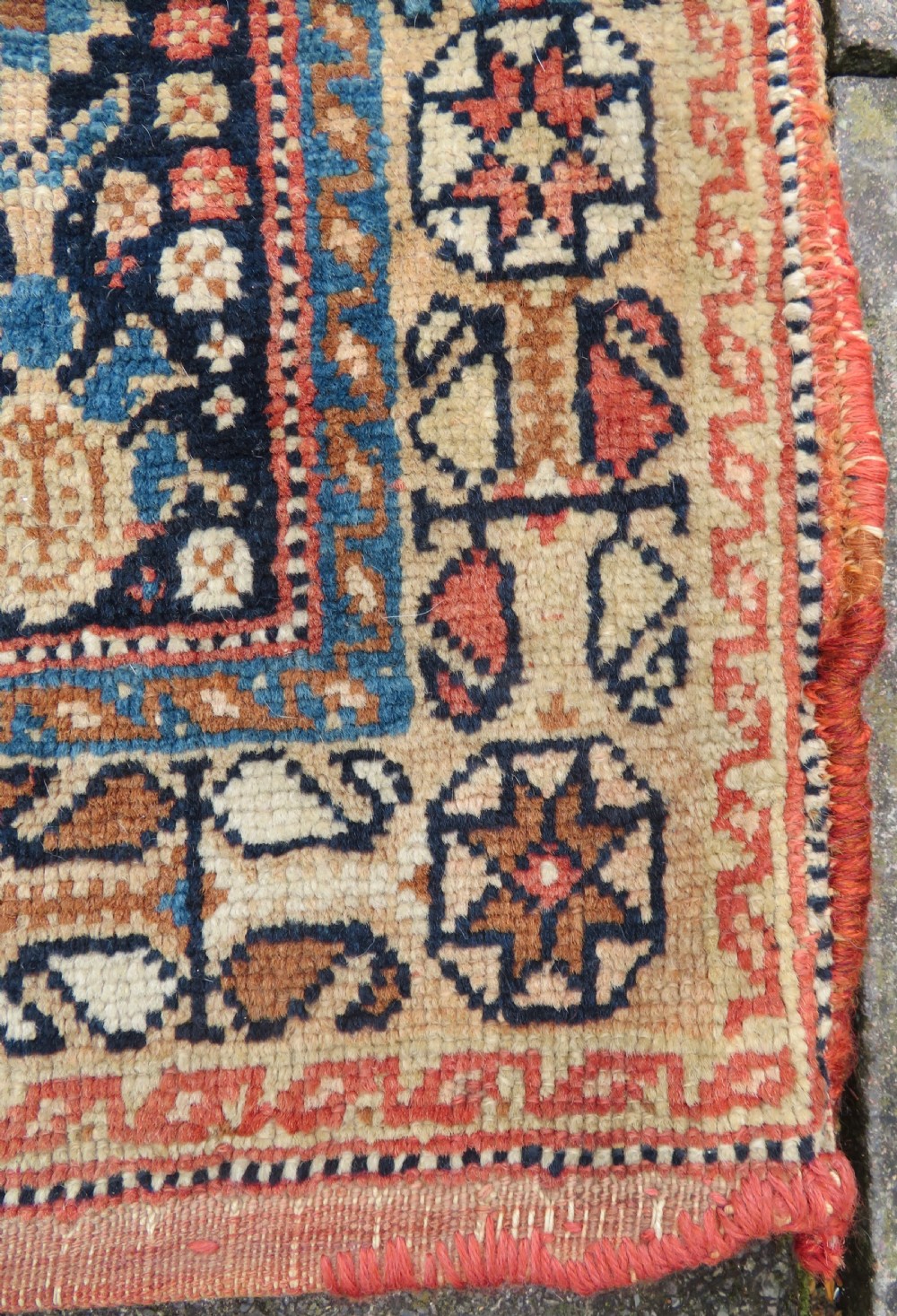 A 19th-century Khamseh hand-knotted wool bag face featuring stylised bird motifs framed by intricate geometric borders in navy blue, terracotta, and ochre. View VII