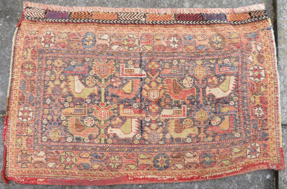 A 19th-century Khamseh hand-knotted wool bag face featuring stylised bird motifs framed by intricate geometric borders in navy blue, terracotta, and ochre. View XI