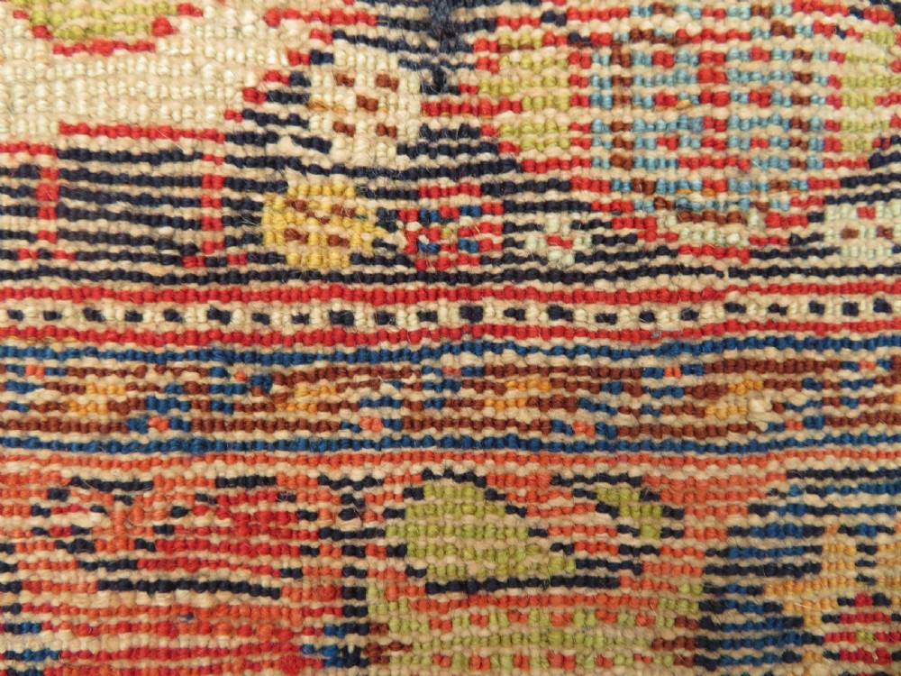 A 19th-century Khamseh hand-knotted wool bag face featuring stylised bird motifs framed by intricate geometric borders in navy blue, terracotta, and ochre. View XIV