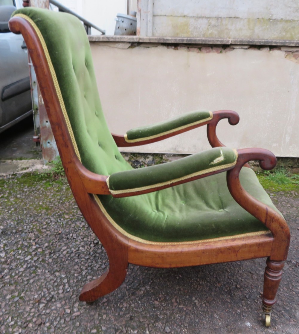 VERY RARE EARLY HOWARD & SONS ELBOW ARMCHAIR.