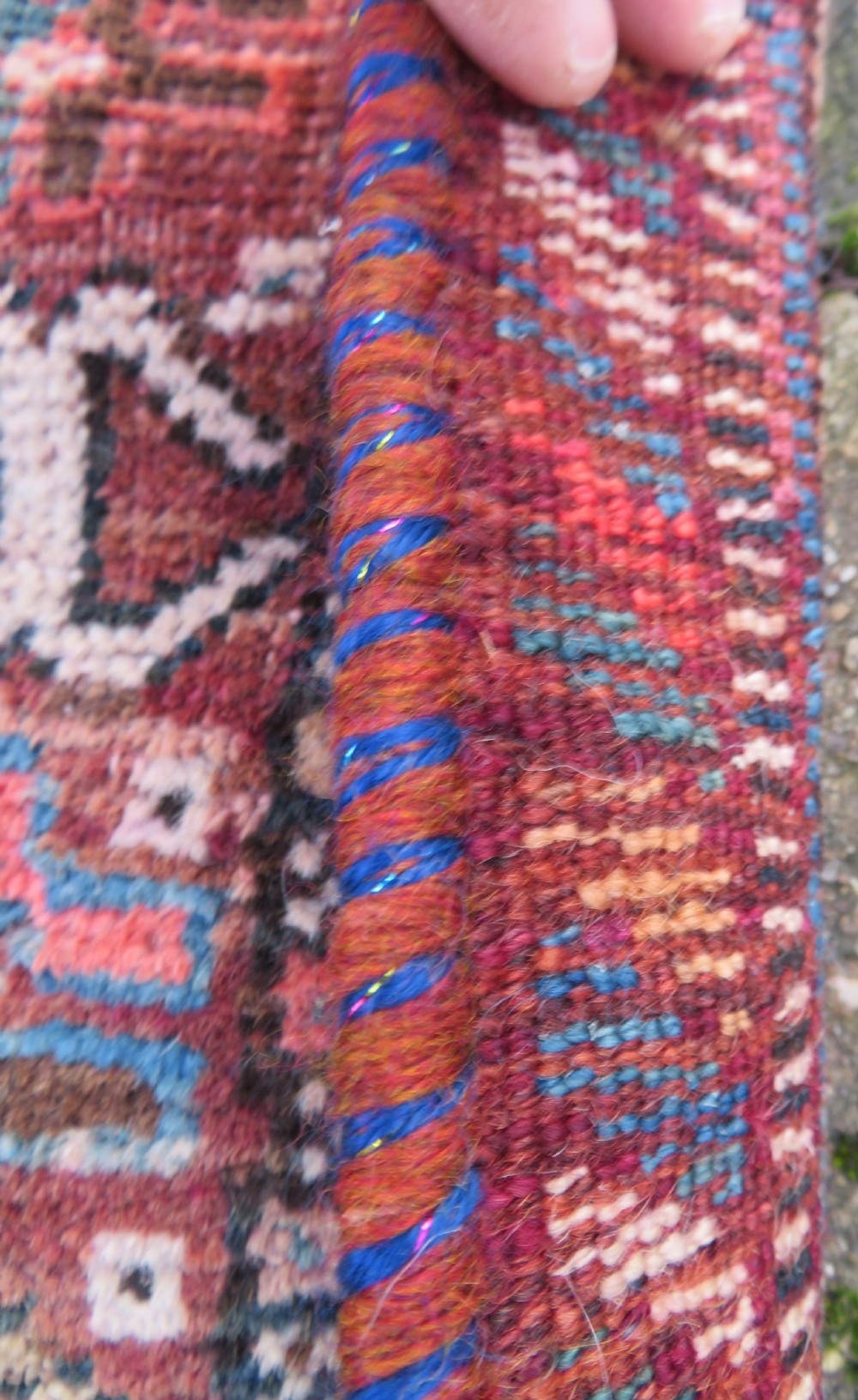 An antique Khamseh hand-knotted wool carpet featuring repeating stylised boteh motifs on a dark navy field with multi-banded geometric borders. View X