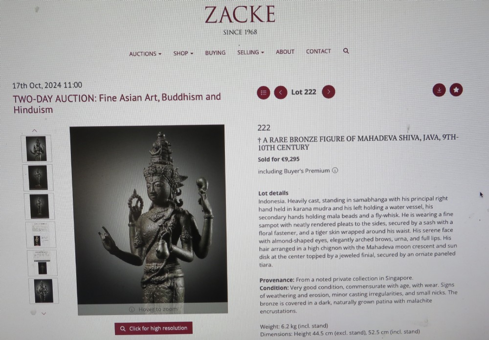 A standing four-armed copper alloy figure of the Hindu deity Shiva on a lotus pedestal with an aged patina. View XIX