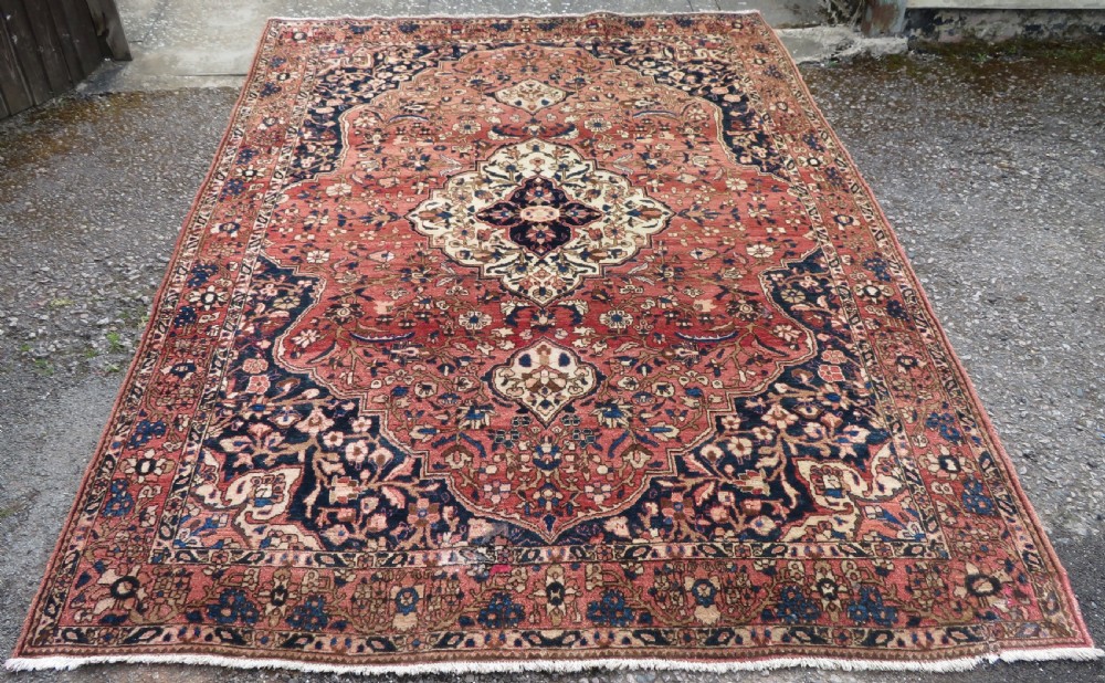 ATTRACTIVE OLD SAROUK CARPET. WEST PERSIA. 306CM X 212CM.
C
