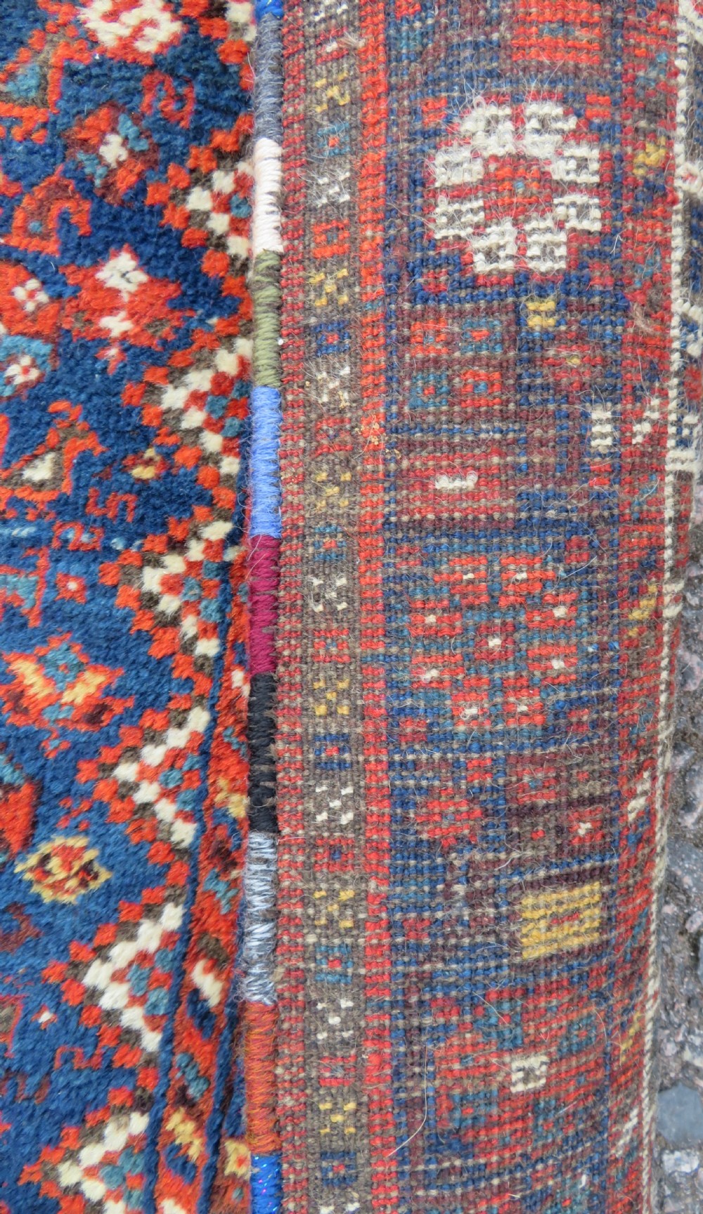 An antique Persian Khamseh carpet featuring three diamond-shaped central medallions and small bird motifs on a dark navy blue field with geometric borders. View XIV