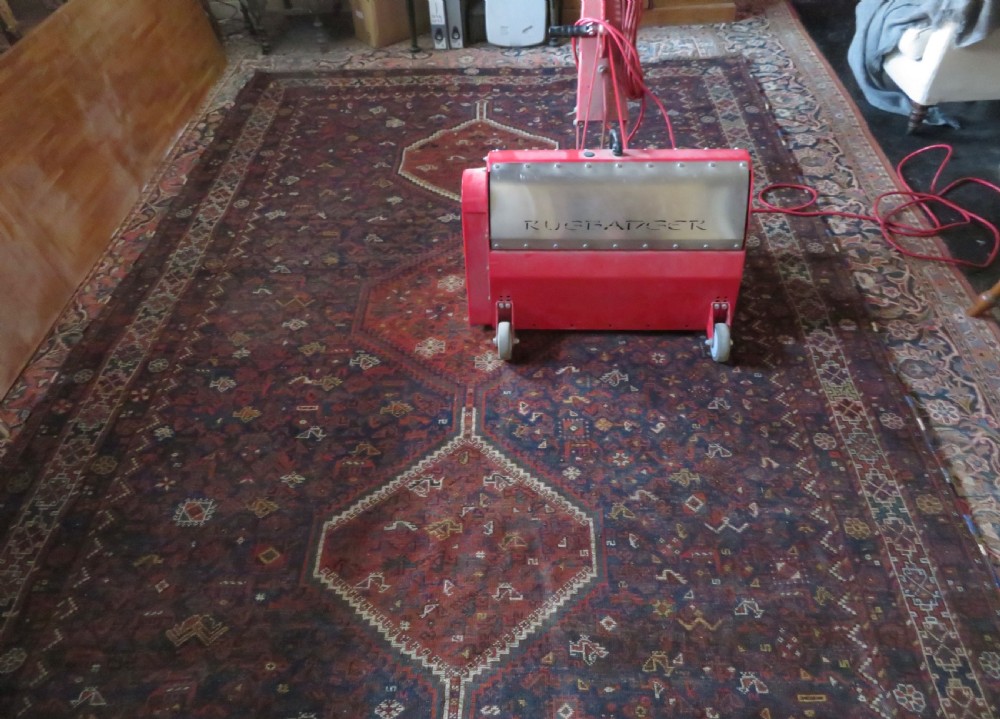 An antique Persian Khamseh carpet featuring three diamond-shaped central medallions and small bird motifs on a dark navy blue field with geometric borders. View XXVI
