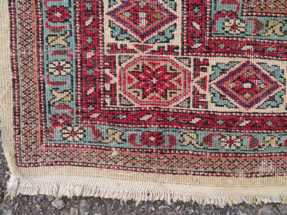 ANTIQUE INDIAN RUG. 199CM X 139CM. View XVI