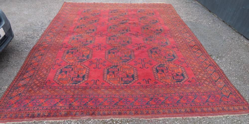 LARGE ANTIQUE AFGHAN ERSARI MAIN CARPET. CIRCA 1880. 427CM X 319CM. View II