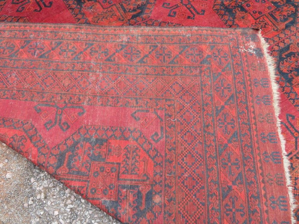 LARGE ANTIQUE AFGHAN ERSARI MAIN CARPET. CIRCA 1880. 427CM X 319CM. View XXV