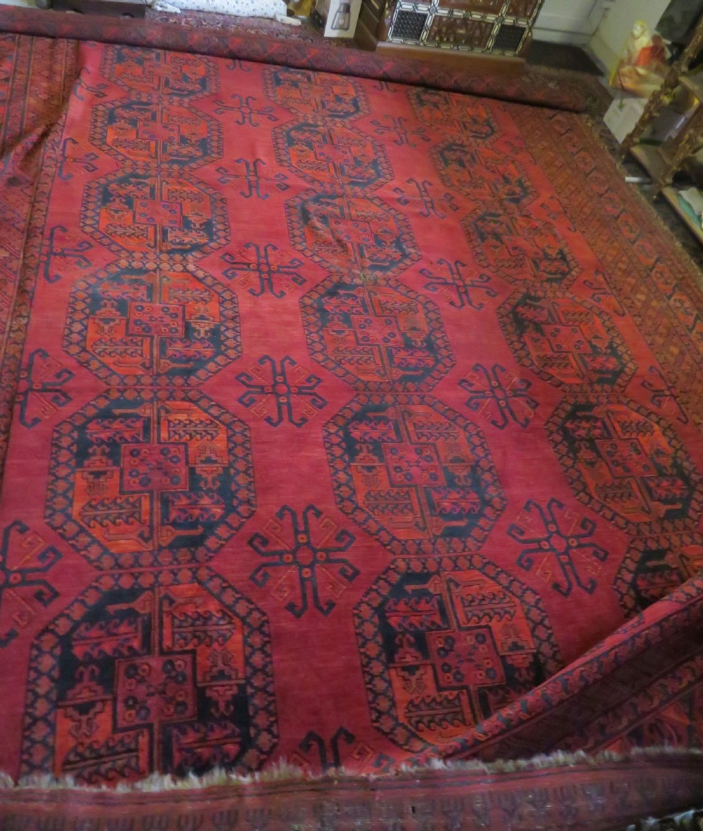 LARGE ANTIQUE AFGHAN ERSARI MAIN CARPET. CIRCA 1880. 427CM X 319CM. View XXVIII
