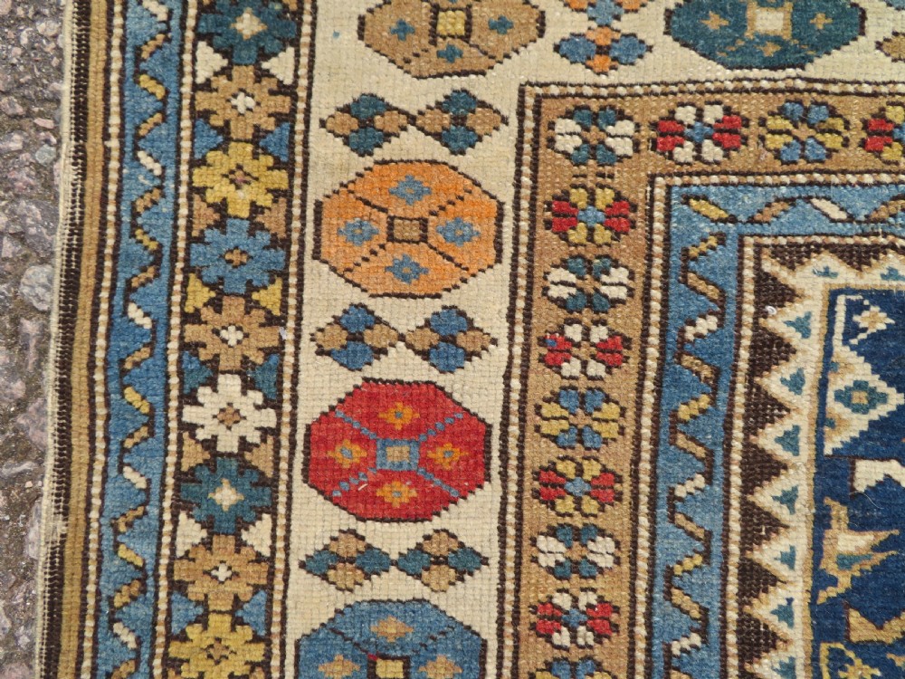 ANTIQUE CAUCASIAN SHIRVAN RUG. 162CM X 112CM. View X
