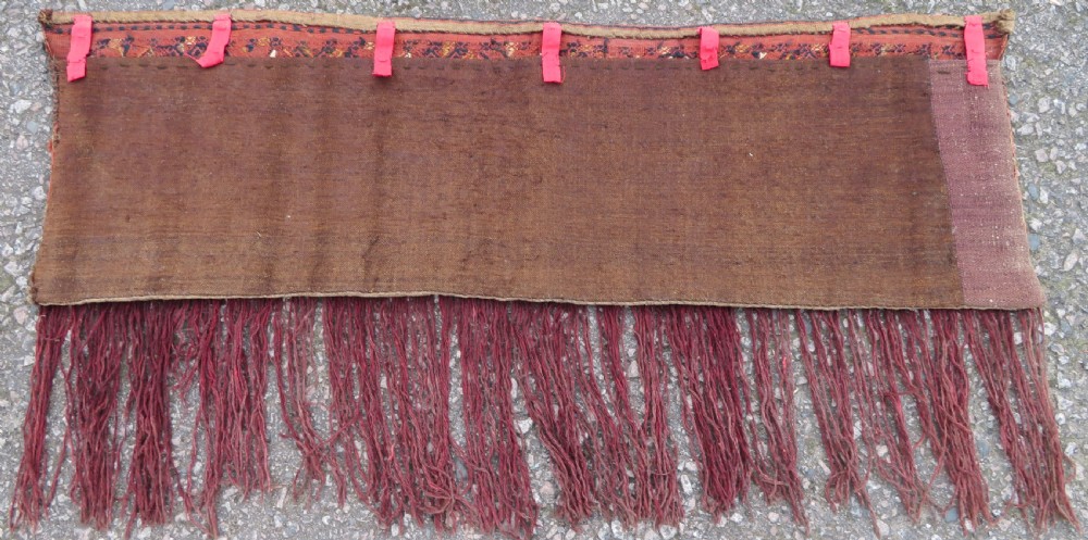 An Ersari Turkmen flatweave wool torba featuring geometric motifs in terracotta red, navy, and ivory, complete with a long fringed lower border. View XIII