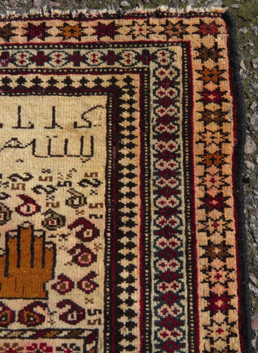 Hand-knotted wool Baluch prayer rug with a cream field featuring stylized camels, birds, hand symbols, and a mihrab top border. View V