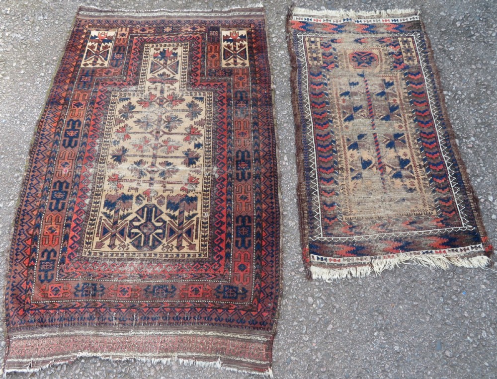 TWO BALUCH PRAYER RUGS. 138CM X 89CM. 106CM X 59CM.