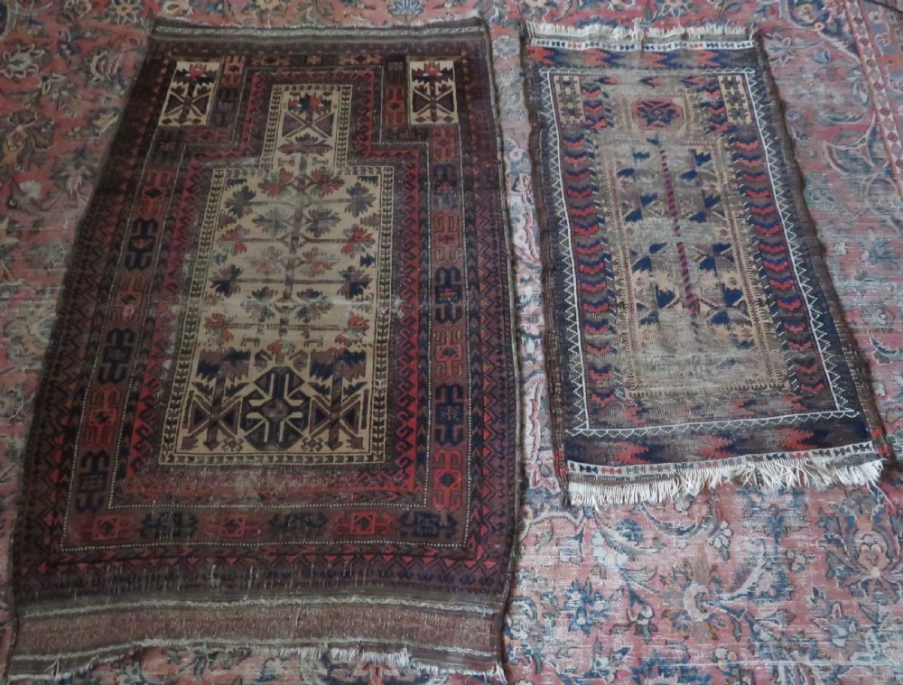 TWO BALUCH PRAYER RUGS. 138CM X 89CM. 106CM X 59CM. View XV