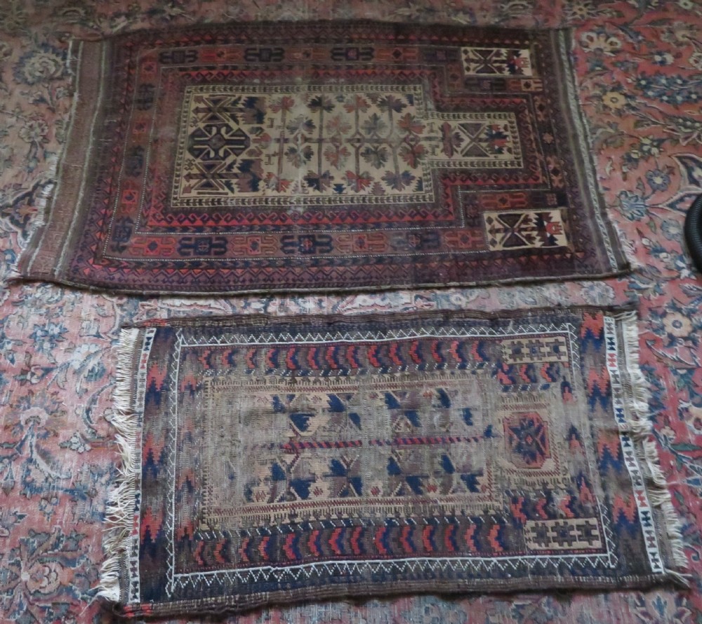 TWO BALUCH PRAYER RUGS. 138CM X 89CM. 106CM X 59CM. View XVI