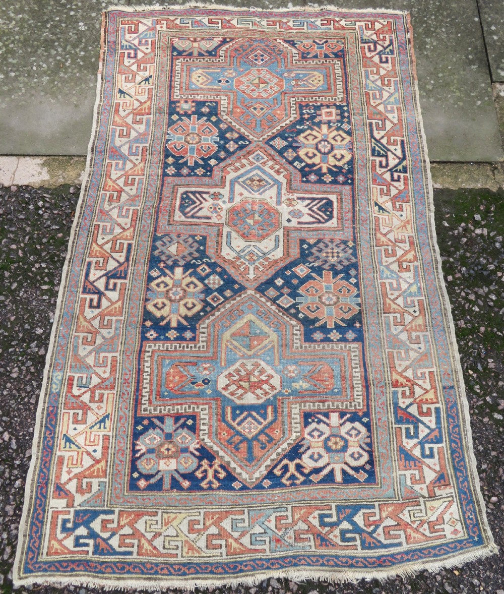 ANTIQUE CAUCASIAN KAZAK RUG. 168CM X 107CM.