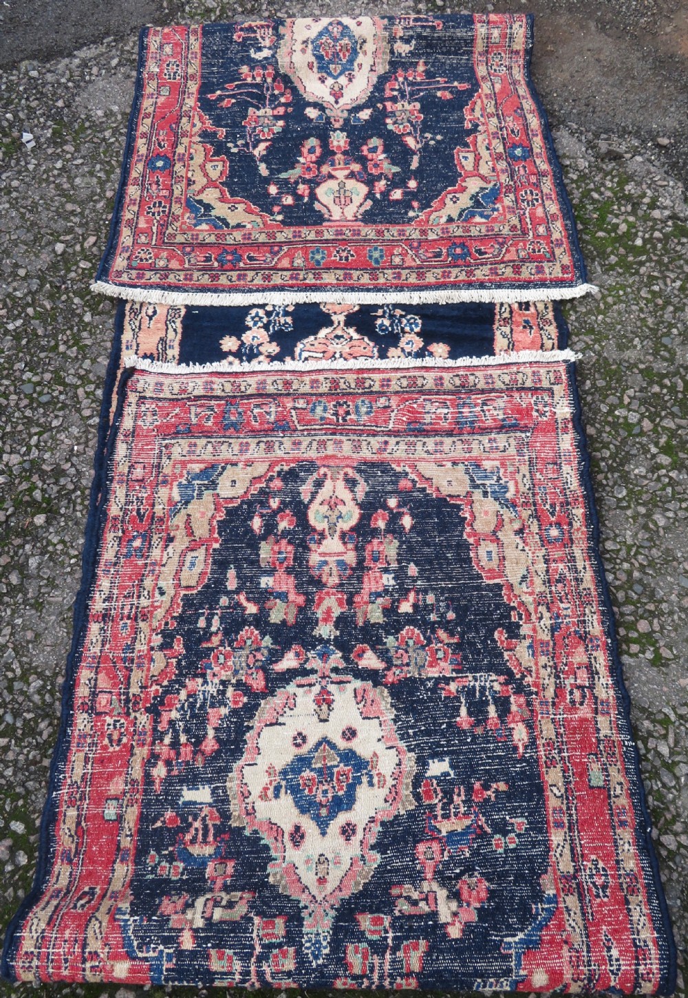 A long, narrow hand-knotted Persian Sarouk runner rug featuring a deep navy blue field, central floral medallions, and terracotta borders. View XIII