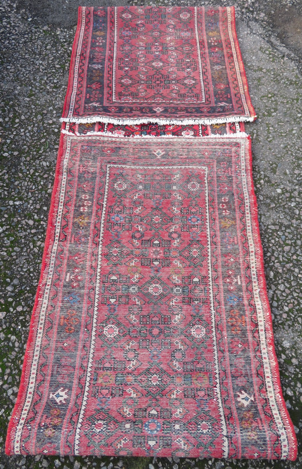 A long, narrow hand-knotted Persian Hamadan runner rug featuring a red field woven with geometric motifs and dark patterned borders. View XVI