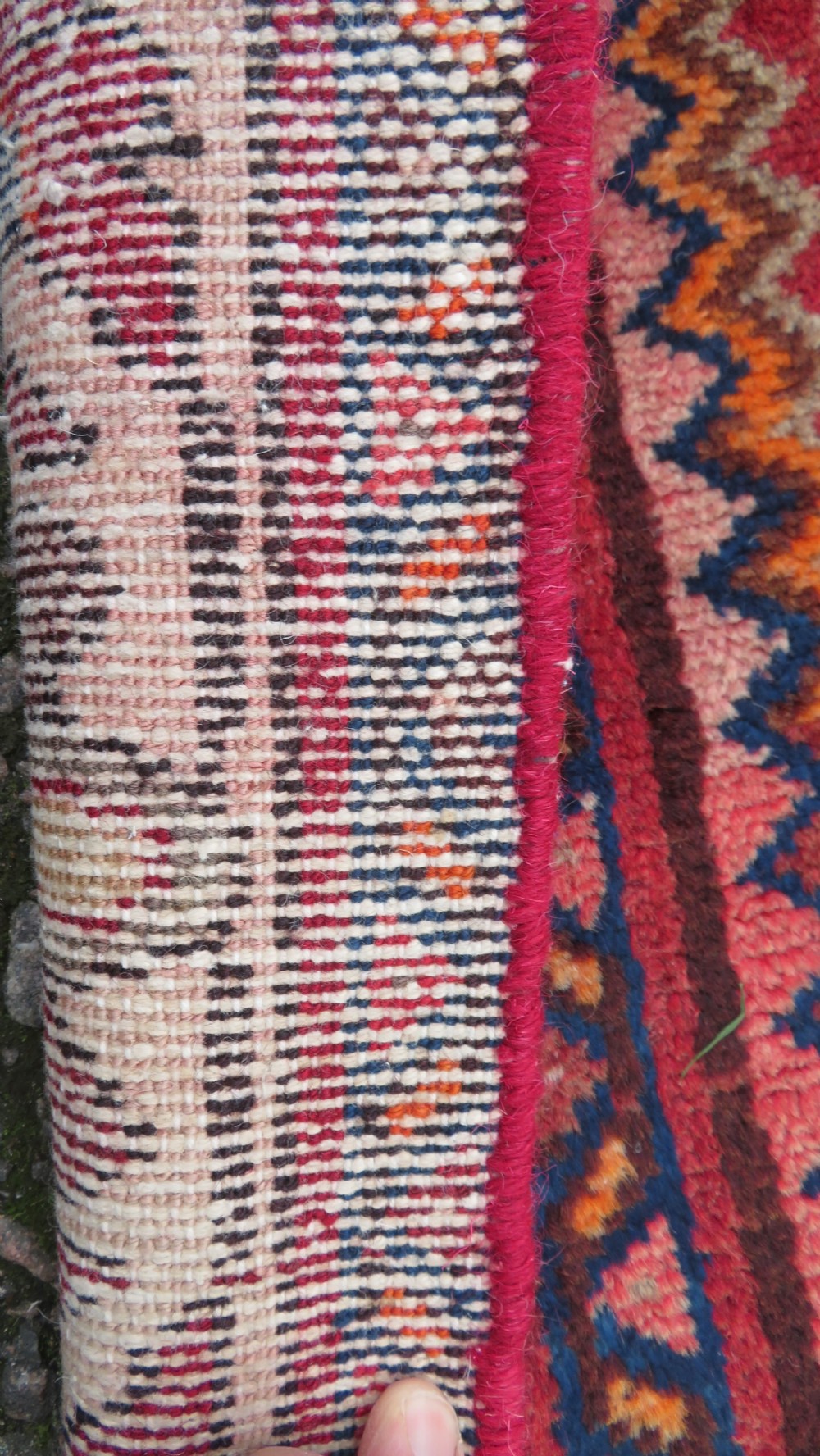 An antique Persian Sanjan Hamadan wool rug runner featuring a central diamond medallion surrounded by geometric motifs in red, cream, and navy blue. View XI