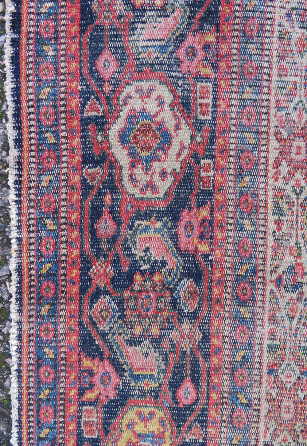 A nineteenth-century Persian Fereghan wool rug featuring an intricate all-over floral lattice pattern framed by navy and terracotta borders. View XIV