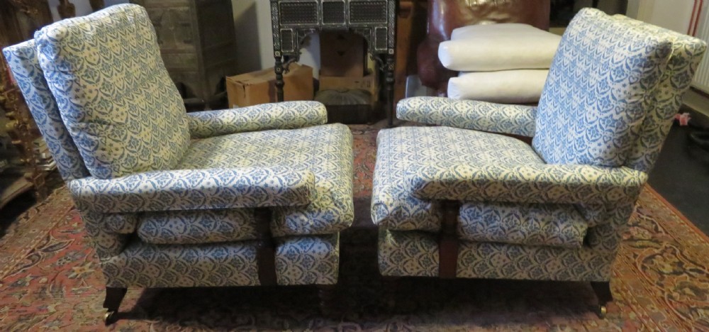 PAIR HOWARD AND SONS OPEN ARMCHAIRS. View III