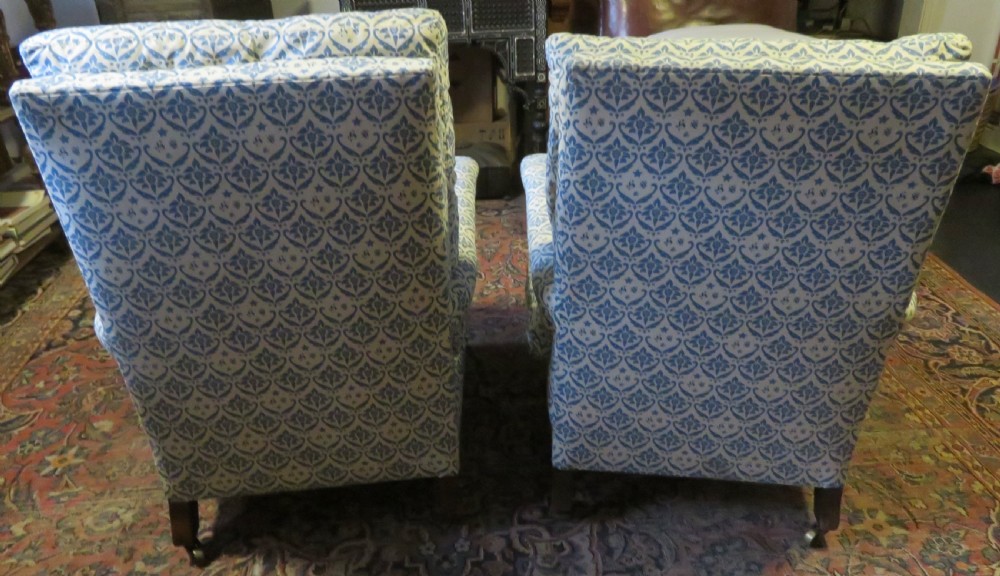 PAIR HOWARD AND SONS OPEN ARMCHAIRS. View IV