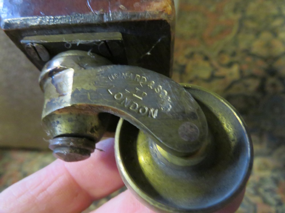 PAIR HOWARD AND SONS OPEN ARMCHAIRS. View XIV