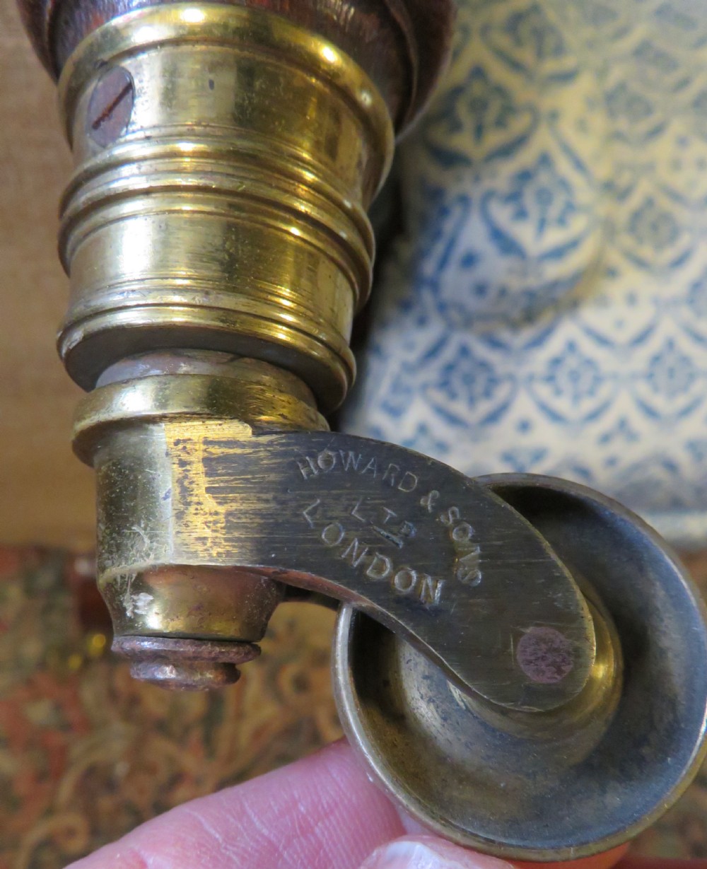 PAIR HOWARD AND SONS OPEN ARMCHAIRS. View XVI