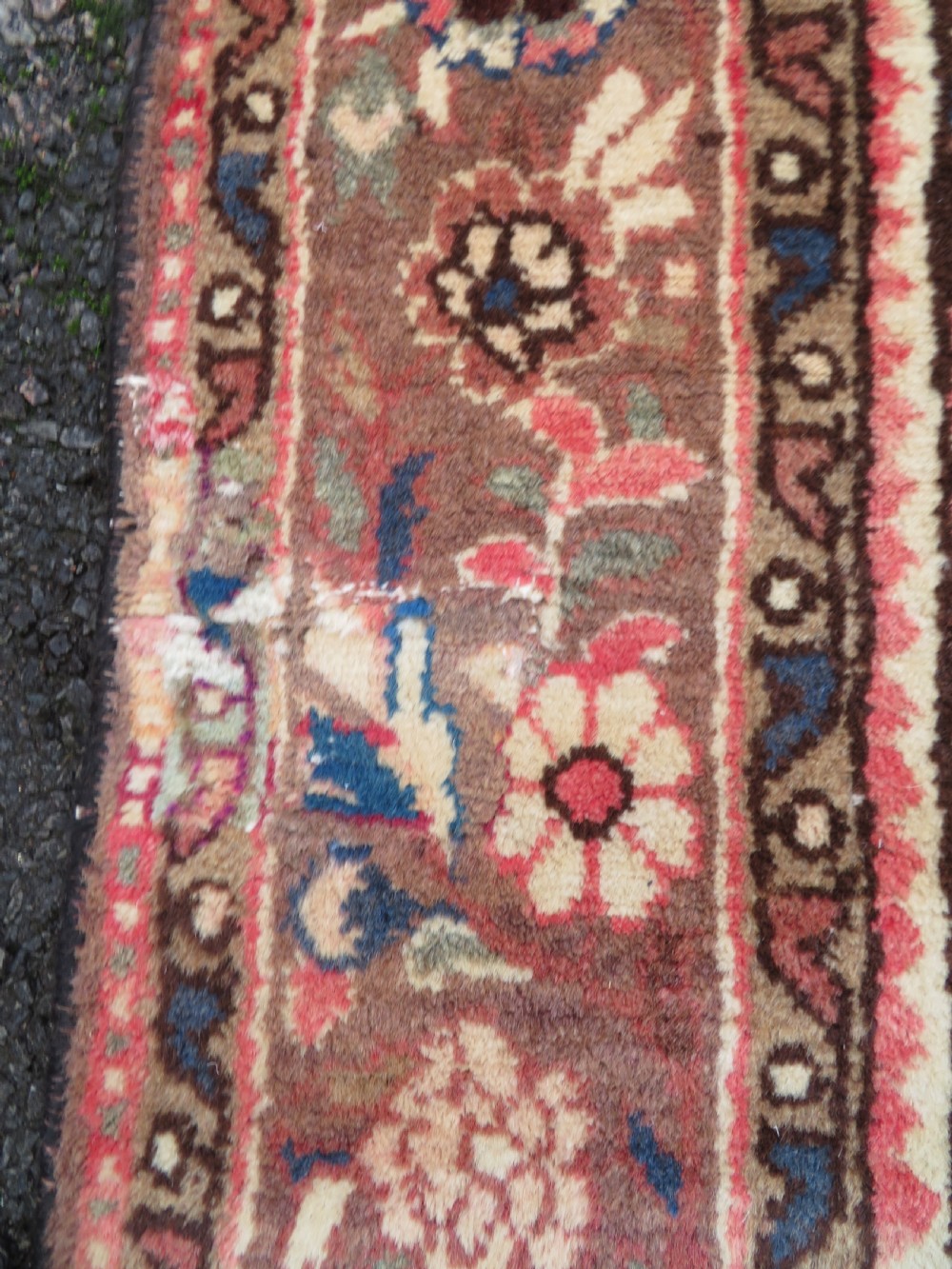 A large rectangular hand-knotted Persian Hamadan wool rug featuring a central floral medallion surrounded by intricate floral motifs in shades of rose pink, cream, brown, and blue. View X