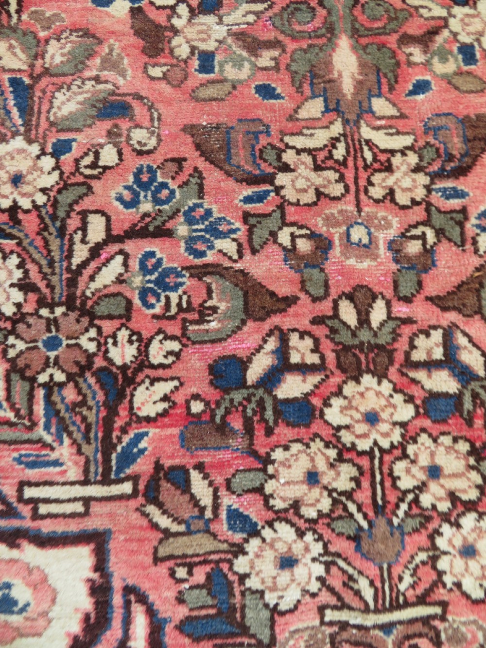 A large rectangular hand-knotted Persian Hamadan wool rug featuring a central floral medallion surrounded by intricate floral motifs in shades of rose pink, cream, brown, and blue. View XI