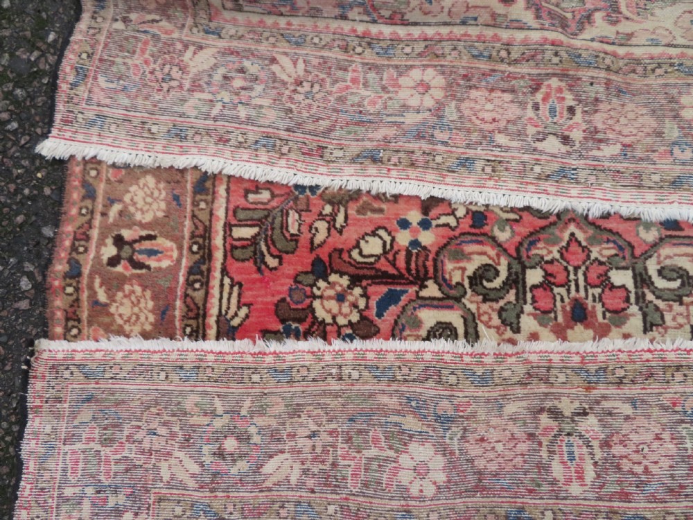 A large rectangular hand-knotted Persian Hamadan wool rug featuring a central floral medallion surrounded by intricate floral motifs in shades of rose pink, cream, brown, and blue. View XIV