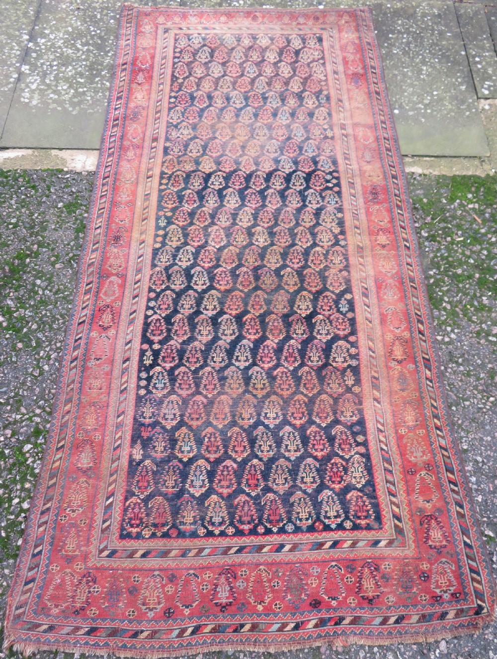 ANTIQUE KHAMSEH TRIBAL RUG. 234CM X 114CM.