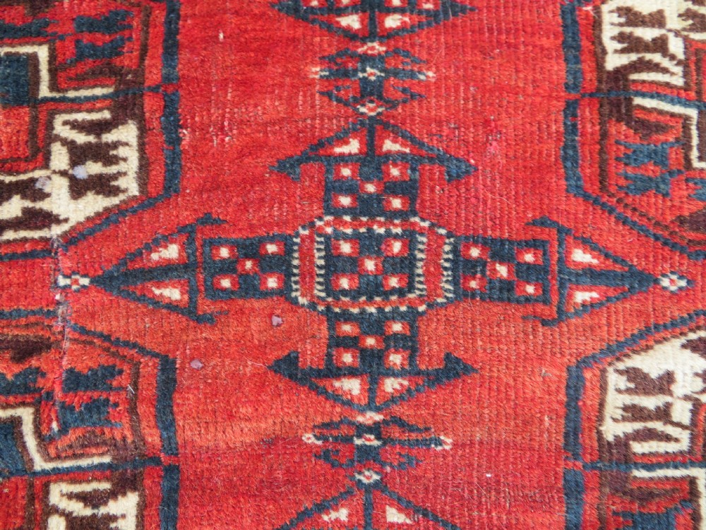 Distressed Antique Tekke Turkmen Rug. 183cm x 126cm. View IV