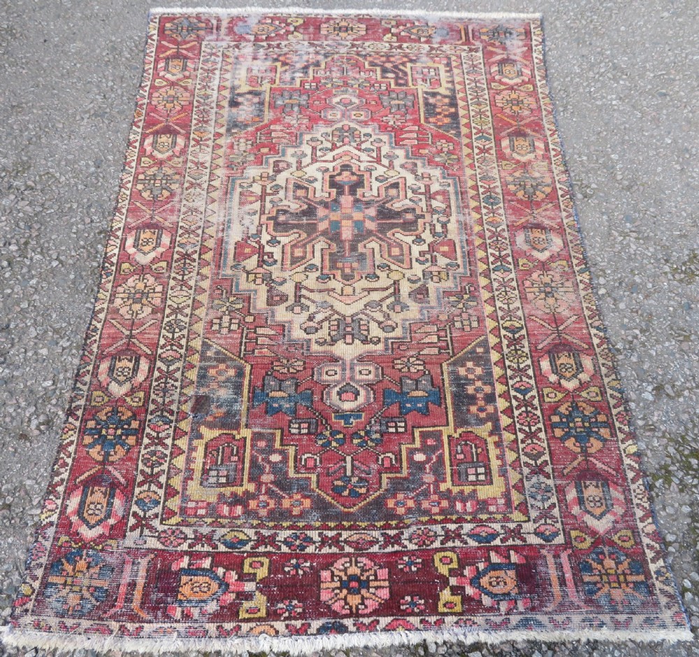 An antique hand-knotted wool Persian Malayer rug featuring a central geometric medallion on a cream and terracotta red field with multi-tiered borders. View II