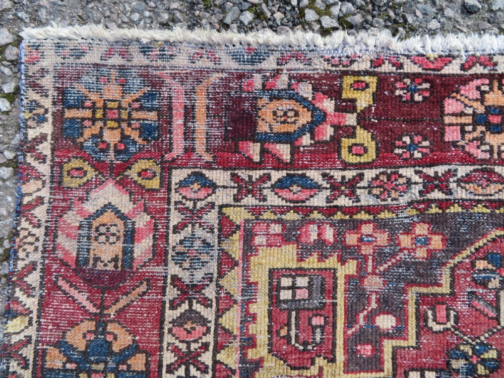 An antique hand-knotted wool Persian Malayer rug featuring a central geometric medallion on a cream and terracotta red field with multi-tiered borders. View VIII