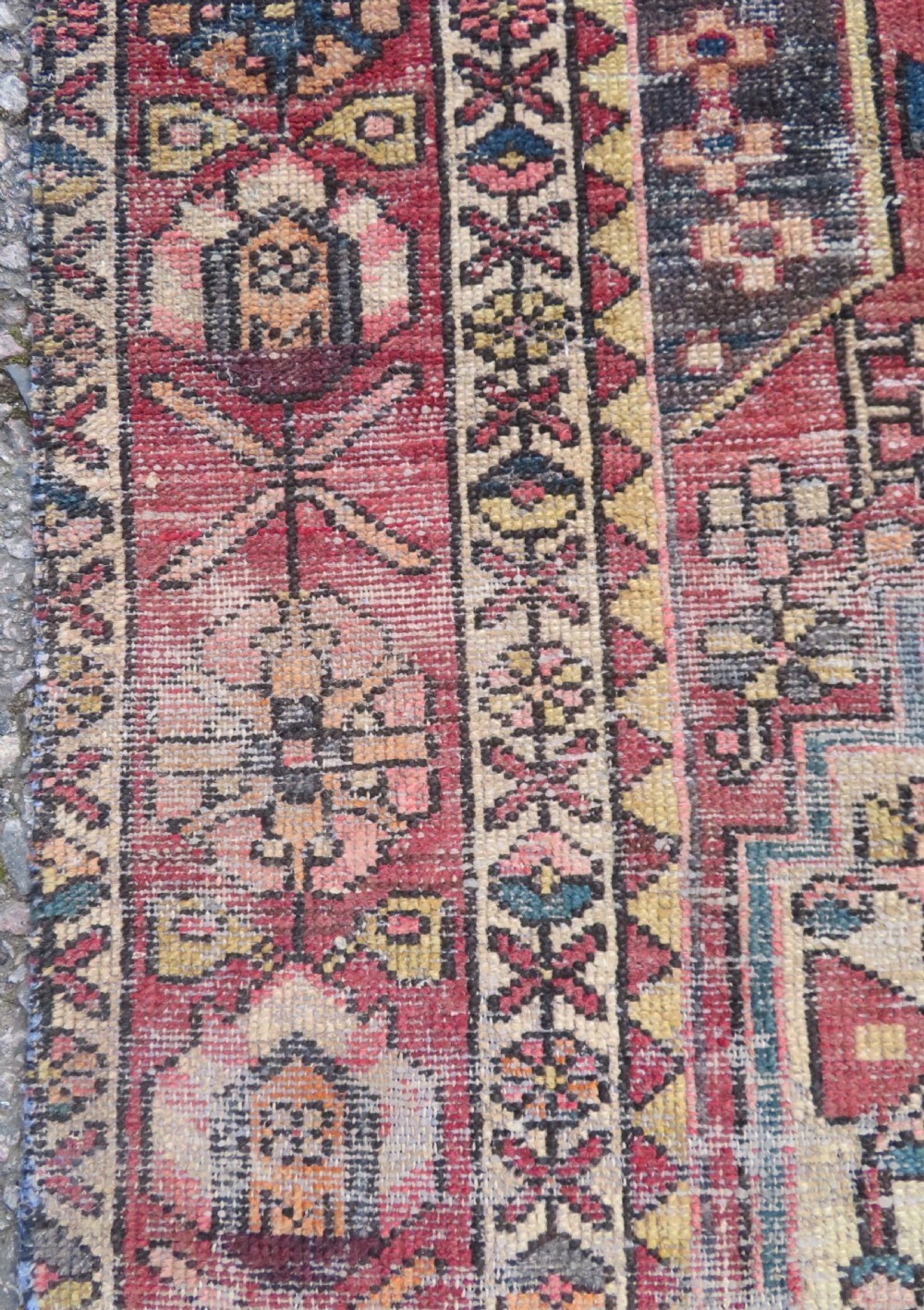 An antique hand-knotted wool Persian Malayer rug featuring a central geometric medallion on a cream and terracotta red field with multi-tiered borders. View IX