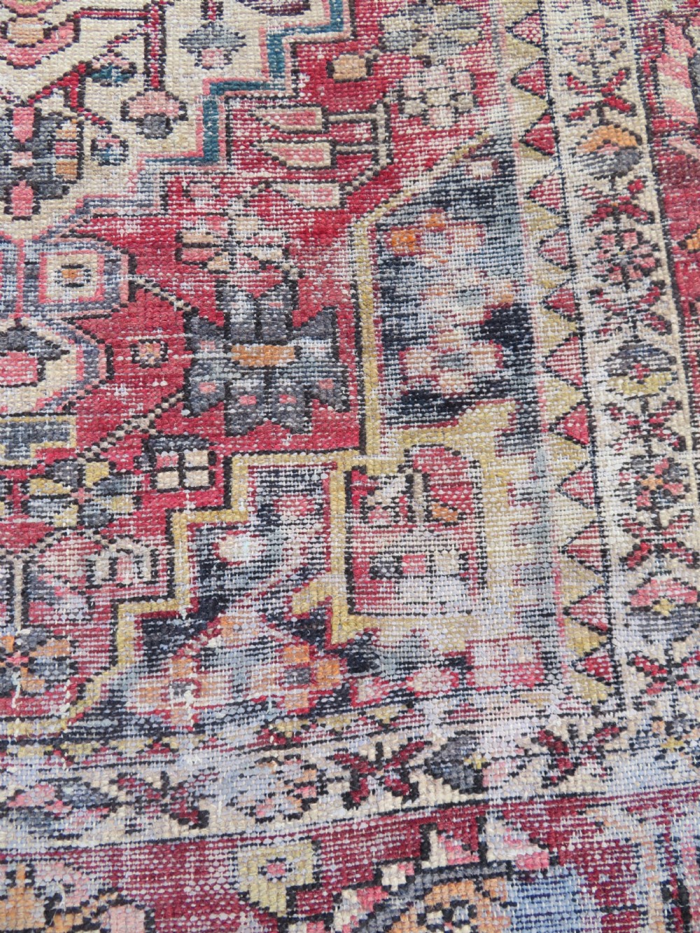 An antique hand-knotted wool Persian Malayer rug featuring a central geometric medallion on a cream and terracotta red field with multi-tiered borders. View XI