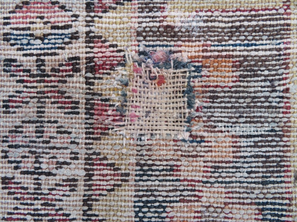 An antique hand-knotted wool Persian Malayer rug featuring a central geometric medallion on a cream and terracotta red field with multi-tiered borders. View XV