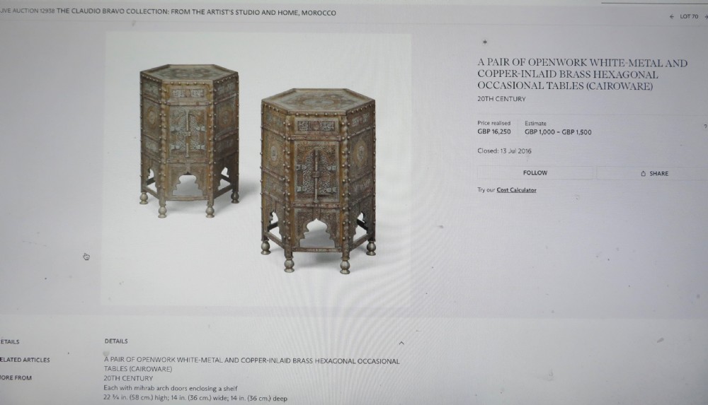 A hexagonal antique brass occasional table with pierced openwork panels, Arabic calligraphic inlays in copper and white metal, and double cabinet doors. View XIII