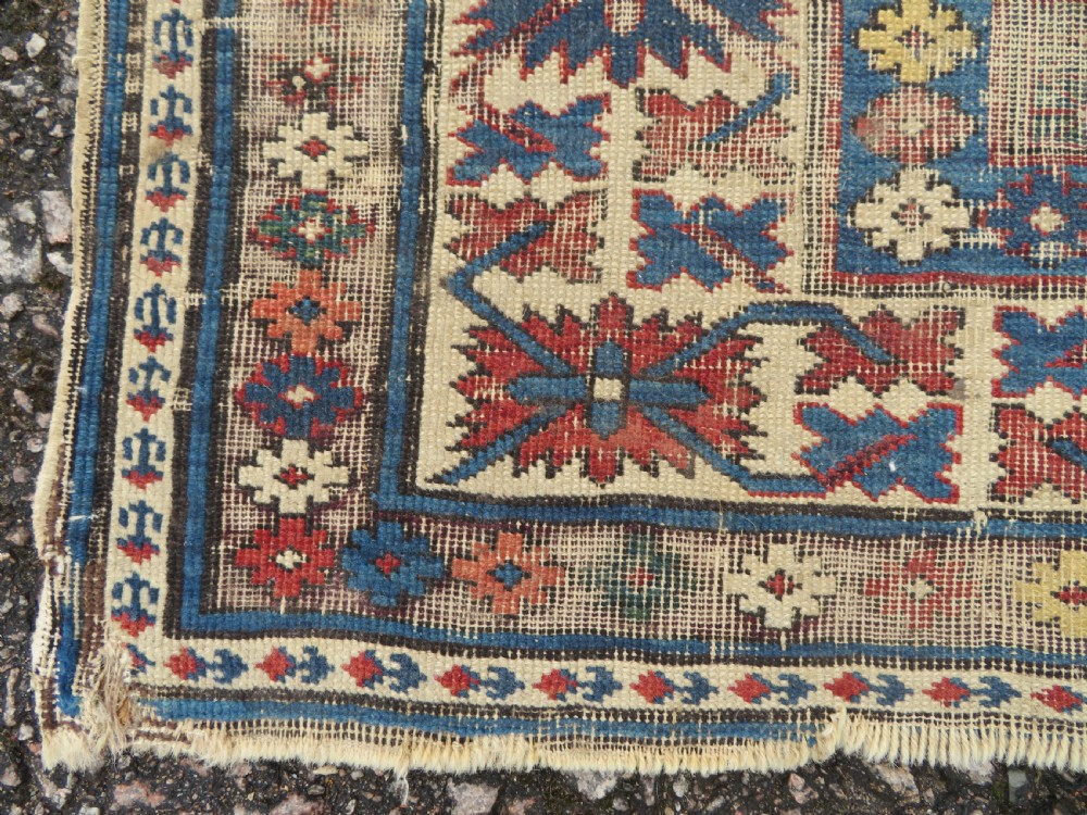 DISTRESSED ANTIQUE CAUCASIAN DAGHESTAN RUG. 135CM X 116CM View III