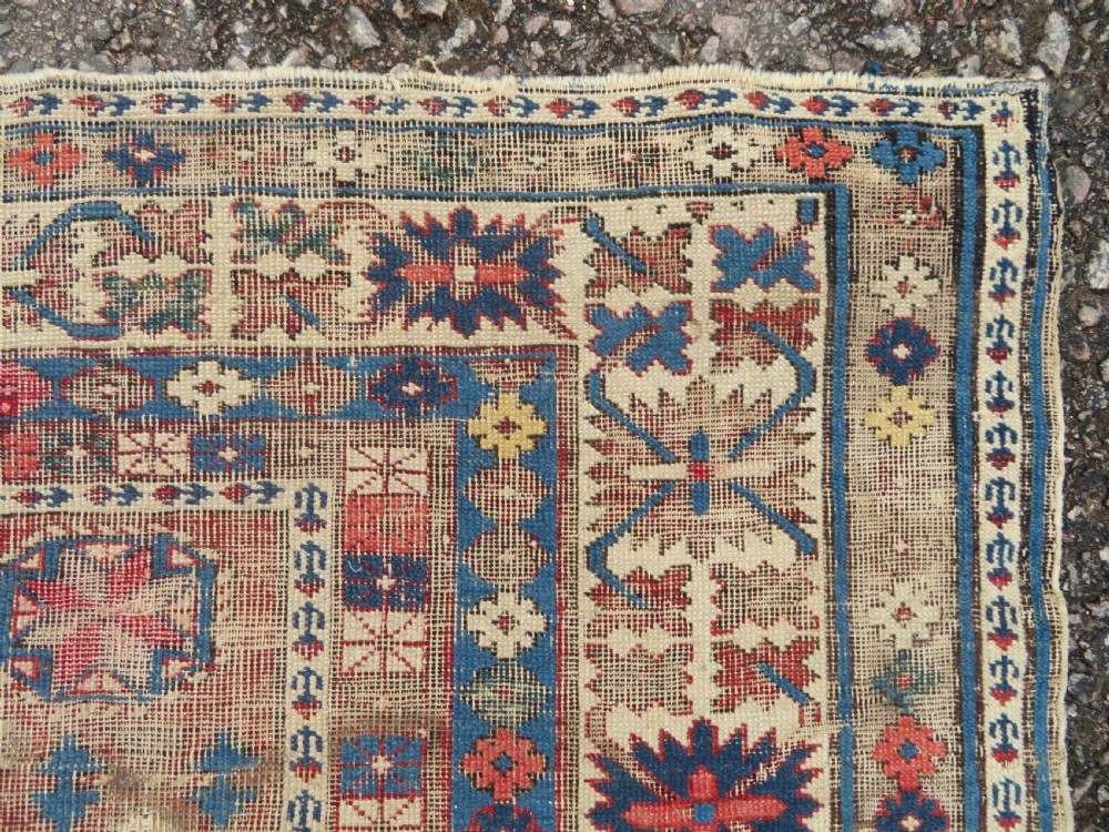 DISTRESSED ANTIQUE CAUCASIAN DAGHESTAN RUG. 135CM X 116CM View V